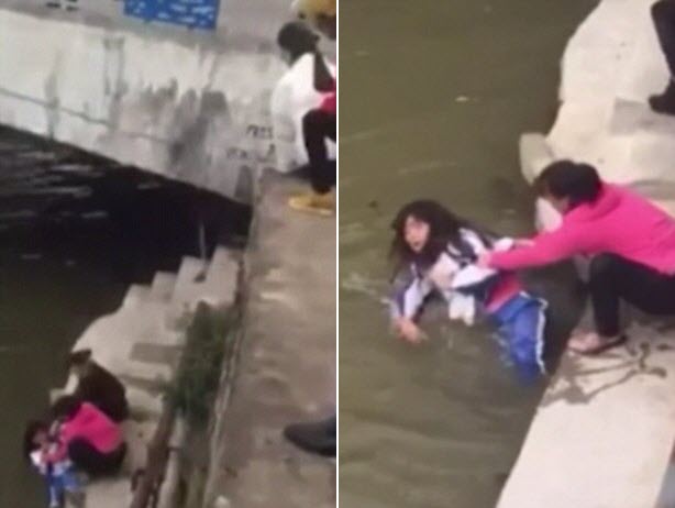 TQ: Mẹ dọa ném con gái xuống sông vì bị điểm kém - 1