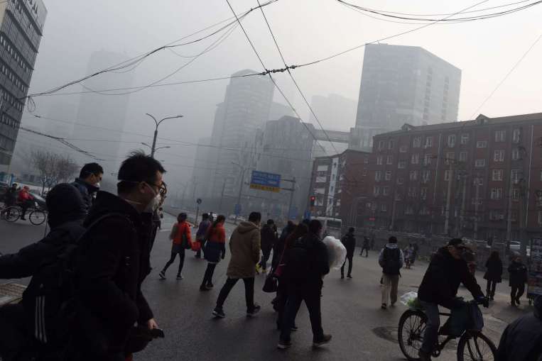 Trung Quốc báo động đỏ lần 2 vì ô nhiễm không khí - 1
