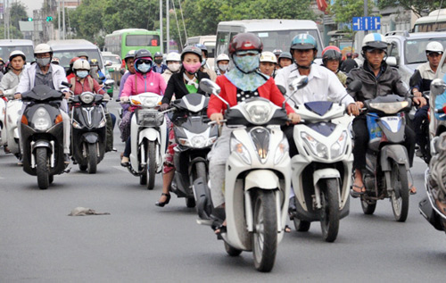 Sài Gòn se lạnh, người dân mặc áo ấm ra đường - 7