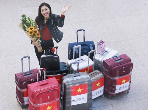 Hoa khôi Diệu Ngọc mang 100kg hành lý đi thi Miss World - 1