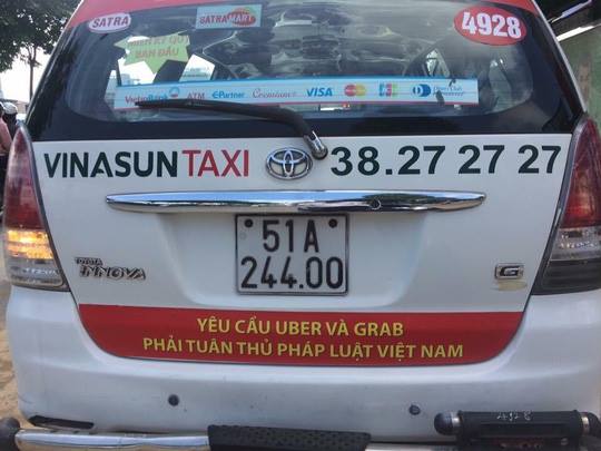 Bộ Công Thương lên tiếng về taxi truyền thống và Grab, Uber - 1
