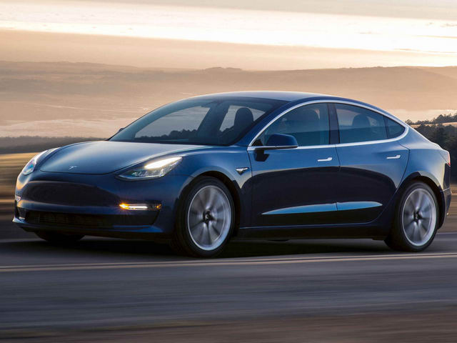 Tesla thua lỗ nặng, nguy cơ lỡ hẹn sản xuất Model 3 - 1