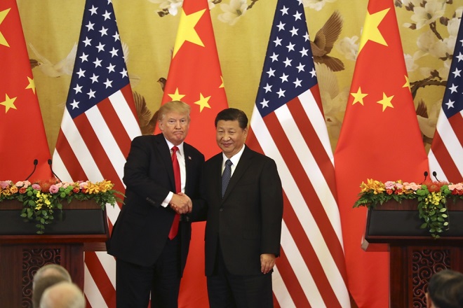 Ông Trump hết lời khen Trung Quốc vì đã &#34;tận dụng Mỹ&#34; - 1