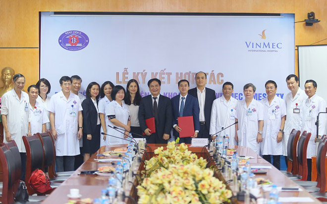 Bệnh viện K và bệnh viện Vinmec hợp tác nghiên cứu, chuyển giao kỹ thuật điều trị ung thư - 1