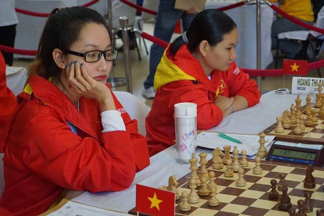 Hot-girl cờ vua Việt gây choáng thế giới: Kim Phụng đả bại 3 nam đại cao thủ - 1