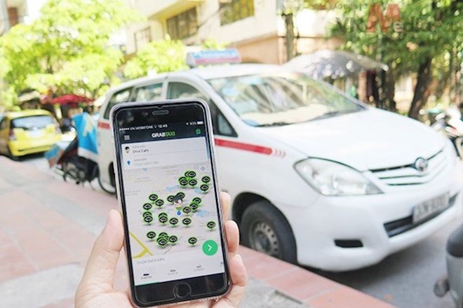 Taxi truyền thống tố Uber, Grab không tuân thủ pháp luật Việt Nam trong thời gian thí điểm - 1