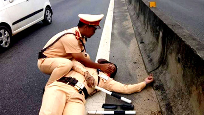 10 năm tù cho tài xế container hất văng CSGT xuống đường, suýt chết - 2